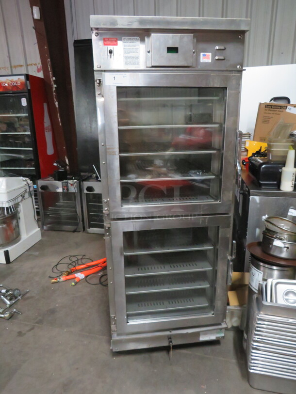 One Winston Industries Heat And Hold Cabinet On Casters. WORKING WHEN REMOVED. Model# HA4522ZE. 220 Volt. 28X33X73 - Image 1 of 4