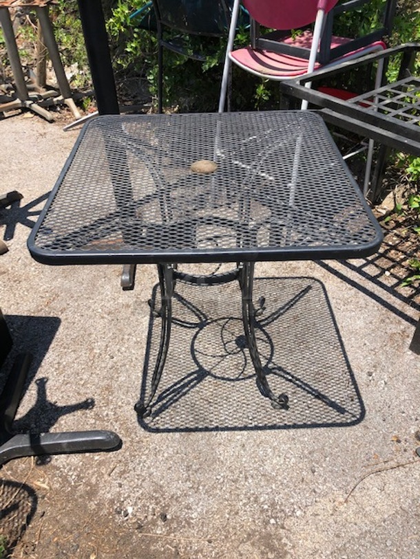 One Black Metal Patio Table. 28X28X28