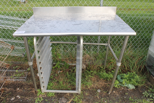 Stainless Steel Commercial Table w/ Back Splash and Pan Rack.