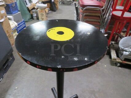 One 24X24X342 Abstract Round Painted  Table Top On A Bar Height Pedestal Base. 