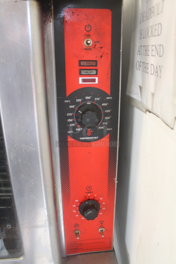 Vulcan VC4GD-11D150K Stainless Steel Commercial Natural Gas Powered Full Size Convection Oven w/ View Through Doors, Thermostatic Controls and Legs on Commercial Casters.  - Image 3 of 6