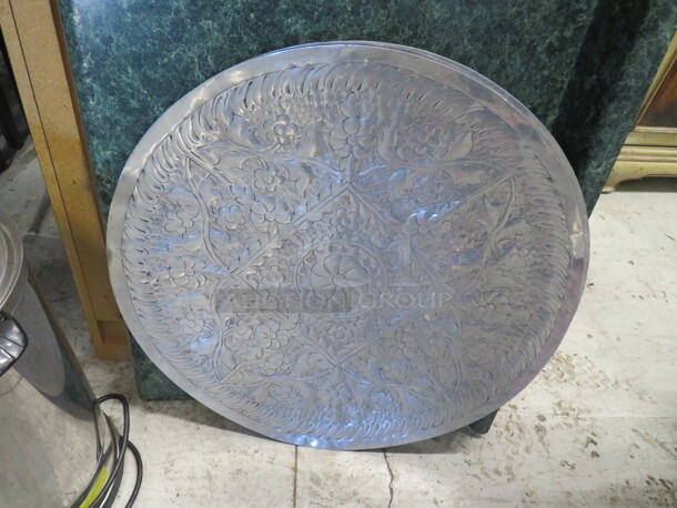 One 26 Inch Round Silver Wall Decor.