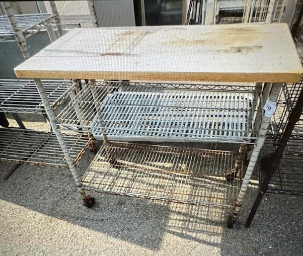 One Metro Shelf With Butcher Block Top And 2 Shelves On Casters. 38X21X34 - Image 1 of 1