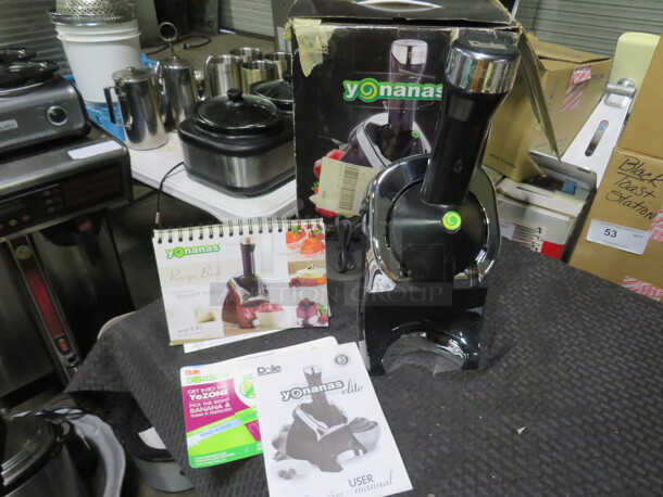 One YoYo Nanas Elite With Cook Book. Looks NEW. Model# 978. 120 Volt.  - Image 1 of 3