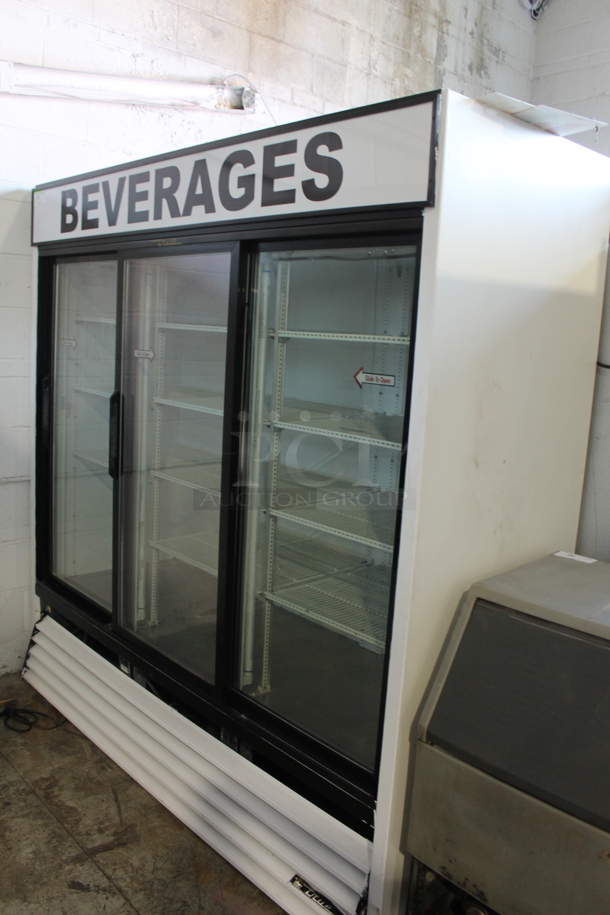 True GDM-69 Metal Commercial 3 Door Reach In Cooler Merchandiser w/ Poly Coated Racks. 115 Volts, 1 Phase. Tested and Does Not Power On - Image 1 of 6