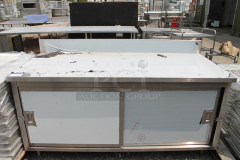 BRAND NEW SCRATCH AND DENT! Stainless Steel Commercial Table w/ Back Splash and 2 Doors. 