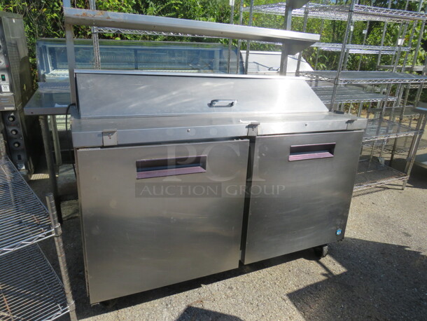 One Hoshizaki 2 Door Refrigerated Prep Table With 2 Racks, 2 SS Over Shelves, On Casters. 115 Volt. Model# CRM R60-16. 60X31.5X66 - Image 1 of 3