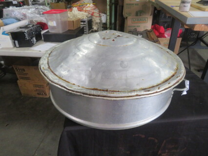 One Aluminum Steamer Pot With Lid.