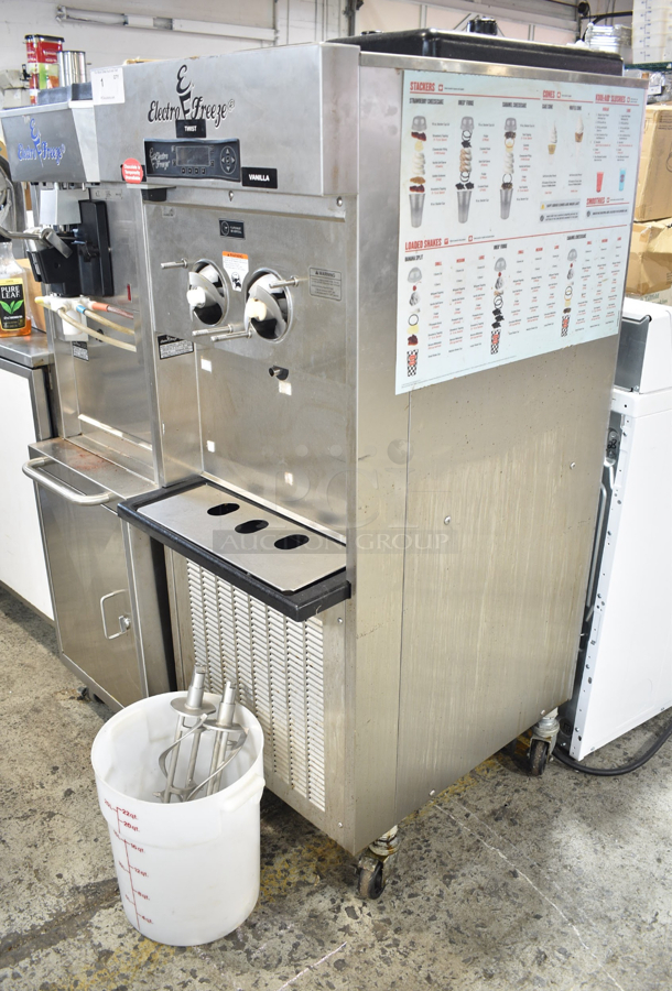 2016 Electro Freeze SLX500-232 Stainless Steel Commercial Floor Style 2 Flavor w/ Twist Soft Serve Ice Cream Machine on Commercial Casters. 208-230 Volts, 3 Phase.  - Image 2 of 11