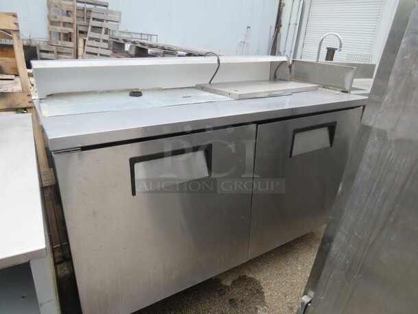 One Stainless Steel True 2 Door Refrigerated Prep Table On Casters, With No Lid. Model# TSSU-60-16. 115 Volt. 60X30X42. - Image 1 of 1
