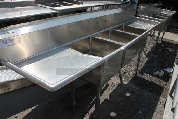 BRAND NEW SCRATCH AND DENT! Regency 60031717224 103" 16-Gauge Stainless Steel Three Compartment Commercial Sink with Galvanized Steel Legs and 2 Drainboards. Bays 17x17x12. Drain Boards 22x19x1 - Image 1 of 8