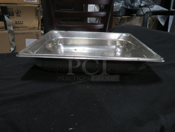 One 1/2 Size 2.5 Inch Deep hotel Pan.