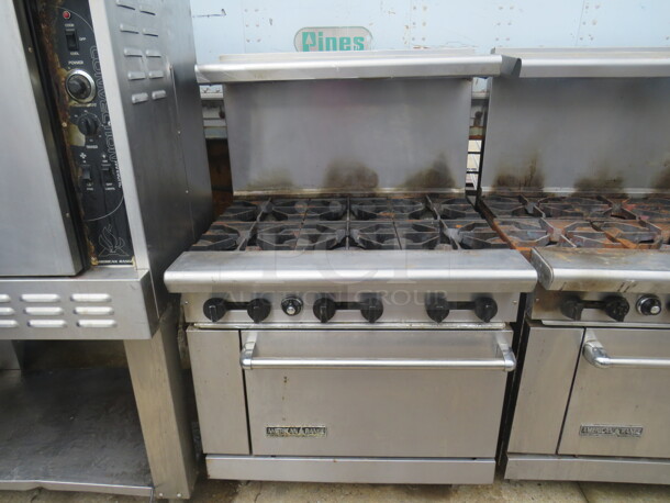 One American Range 6 Burner Natural Gas Range With 1 Rack, And SS Over Shelf. 36X33X56