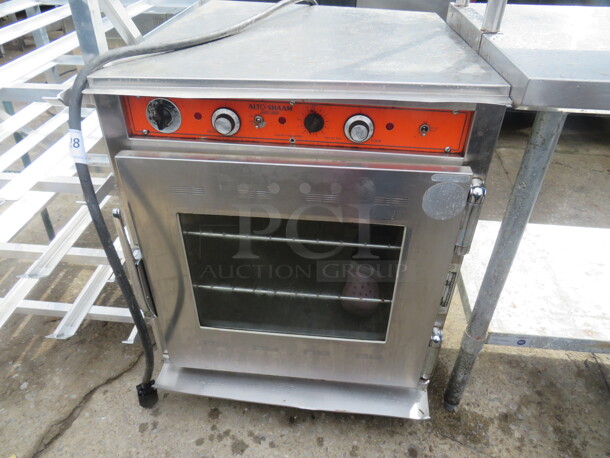 One Alto Sham Halo Heat Commercial Cook And Hold With 2 Racks On Casters. Model# CH-75/DM. 120/240-208 Volt. 25X33X33