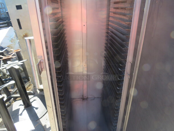 One WORKING Carter Hoffman 1 Door Heat And Hold On Casters. Model# PH1825NY. 120 Volt. 1455 Watt. 28X36X73.  - Image 2 of 3