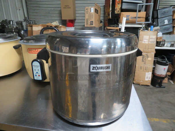 One Stainless Steel Zojirushi Rice Warmer. 