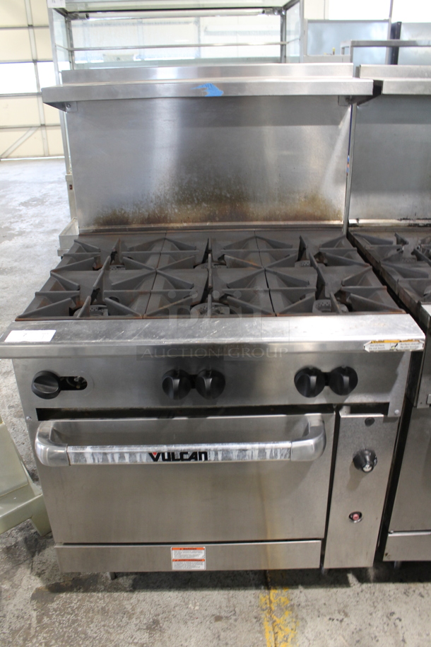 LATE MODEL! Vulcan 36S-6BN Stainless Steel Commercial Natural Gas Powered 6 Burner Range w/ Oven, Over Shelf and Back Splash. - Image 1 of 12