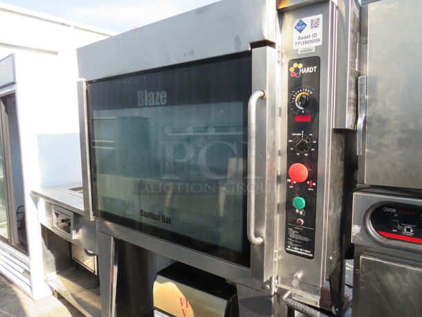 One Stainless Steel Hardt Blaze Natural Gas Rotisserie On Stand With Casters. 50X45X73 - Image 1 of 2