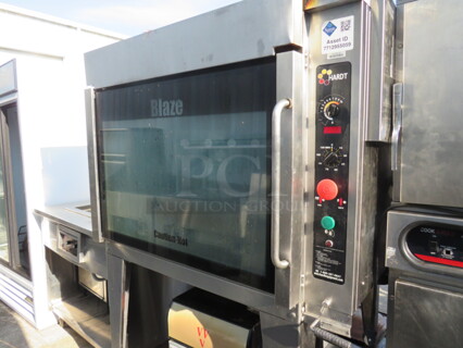 One Stainless Steel Hardt Blaze Natural Gas Rotisserie On Stand With Casters. 50X45X73