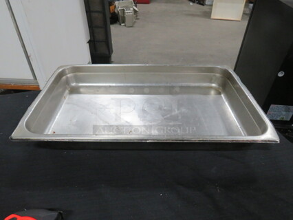 One Full Size 2.5 Inch Deep Hotel Pan.