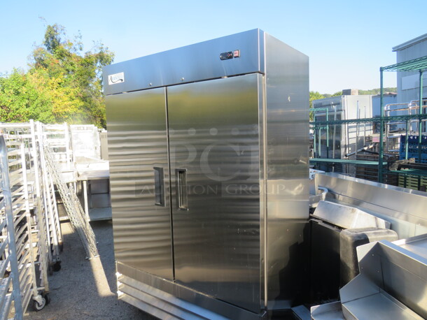 One Avantco 2 Door Stainless Steel Freezer With 6 Rack On Casters. Model# 178A49FHC. 115 Volt. 54X32X82.5 - Image 1 of 3