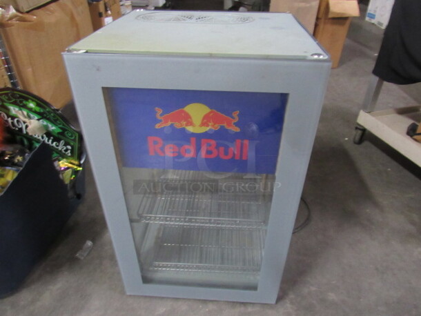 One Dual Door Pass Thru Red Bull Glass Cooler With 2 Racks. Model# Small Gastro Cooler. 115 Volt. 15.5X15.5X25