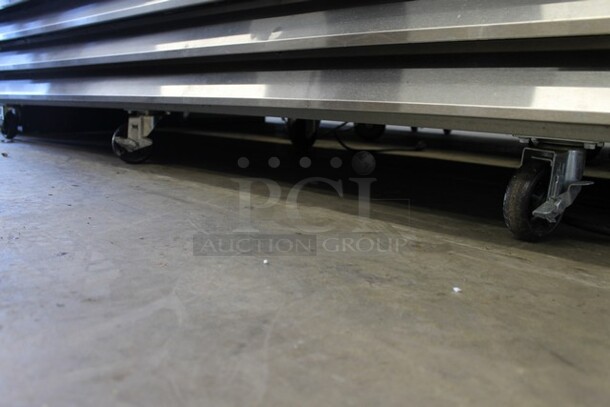 Avantco 178SS3FHC Stainless Steel Commercial 3 Door Reach In Freezer w/ Poly Coated Racks on Commercial Casters. 115 Volts, 1 Phase. Tested and Working! - Image 6 of 6