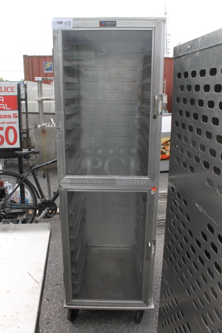 Lockwood Metal Commercial Enclosed Pan Transport Rack on Commercial Casters. 