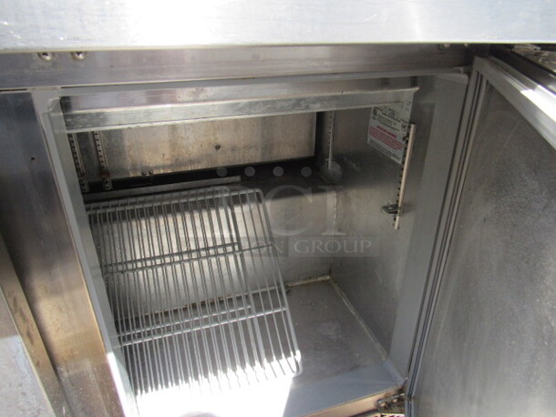 One SS Continental 2 Door, 2 Drawer Continental Refrigerated Prep Table With 2 Racks. Missing 1 Handle. 115 Volt. Model# SW72-30M. 72X36X35. - Image 2 of 2