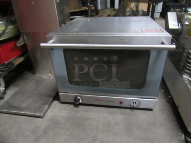 One SS Wisco Convection Oven With 2 Racks. #620. 120 Volt. 19X20X15