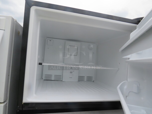 One SS Frigidaire Refrigerator/Freezer. Model# FFTR2021TS5. 115 Volt. 30X31X68 - Image 2 of 4