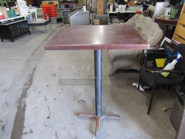 One Wooden Table Top On A Bar Height Pedestal Base.  30X24X42.5