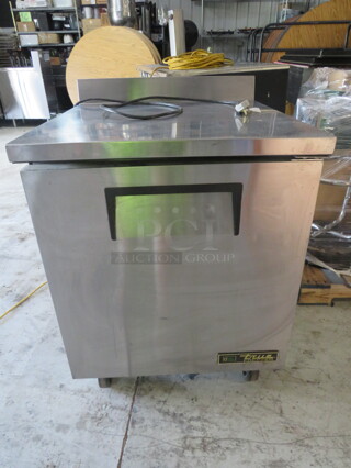 One True 1 Door Worktop Freezer With 2 Racks On Casters. NOT Working. 115 Volt. Model# TWT-27F-HC. 27.5X30X39