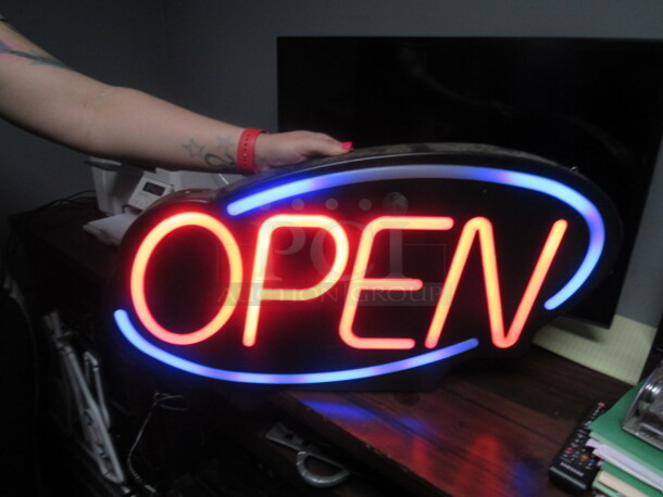 One 26X15 Lighted OPEN SIGN.