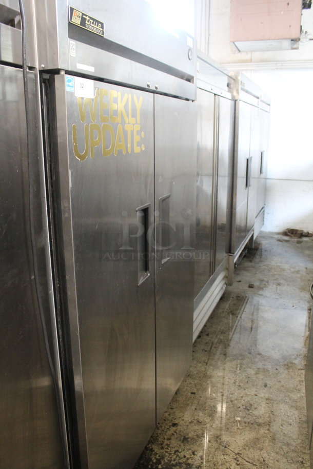 2014 True TG2R-2S Stainless Steel Commercial 2 Door Reach In Cooler w/ Poly Coated Racks on Commercial Casters. 115 Volts, 1 Phase. Tested and Working! - Image 1 of 6