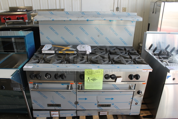 BRAND NEW SCRATCH AND DENT! Vulcan 60SS-10BN Stainless Steel Commercial Natural Gas Powered 10 Burner Range w/ 2 Ovens, Over Shelf and Back Splash.  - Image 1 of 9