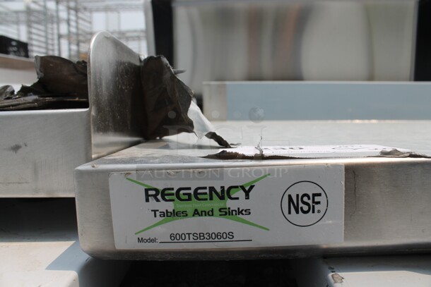 BRAND NEW SCRATCH AND DENT! Regency 600TSB3060S Commercial Stainless Steel Disassembled Work Table With Backsplash, Undershelf And Legs. - Image 2 of 6