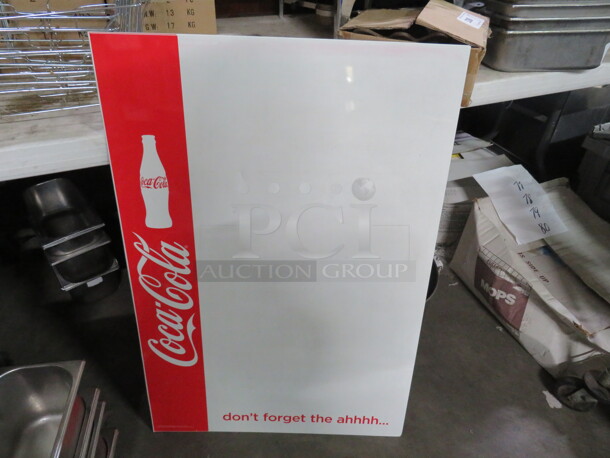 One 24X35 Coca Cola Metal Dry Erase Board. 