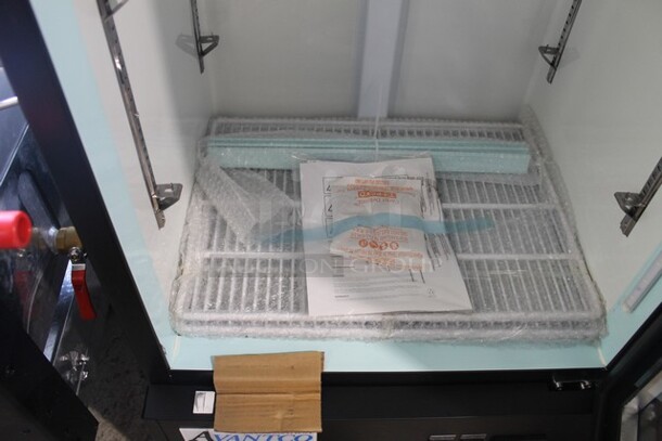 BRAND NEW SCRATCH AND DENT! Avantco 178GDC15HCB Metal Commercial Single Door Reach In Cooler Merchandiser w/ Poly Coated Racks. 115 Volts, 1 Phase. Tested and Working! - Image 8 of 9