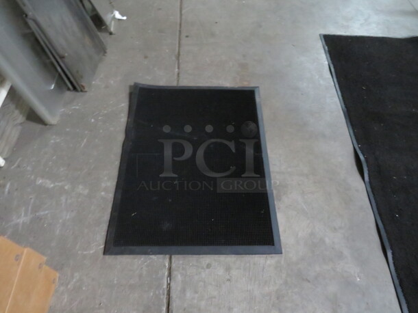 One 32X24 Rubber Rug - Image 1 of 1