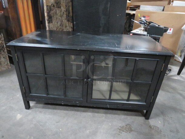 One 2 Door Entertainment Cabinet With Glass Doors. 44X19X24