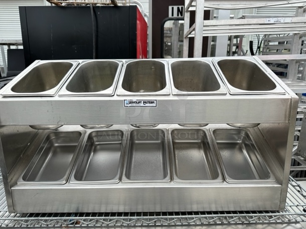 One Stainless Steel Servolift 10 Pan Silverware Dispenser/Organizer. Model#P10. 10-1/4 Size Hotel Pans Included. 34X13X17. $1008.56. - Image 1 of 1