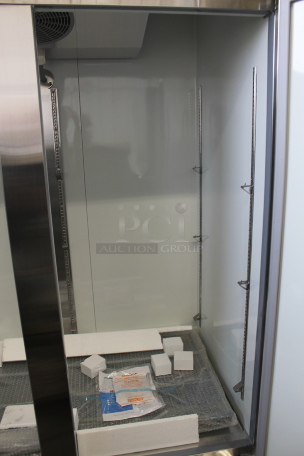 BRAND NEW SCRATCH AND DENT! Avantco A-49R-HC 54" Solid Double Door Stainless Steel Reach-In Refrigerator. 115V. Tested and Working! - Image 5 of 9