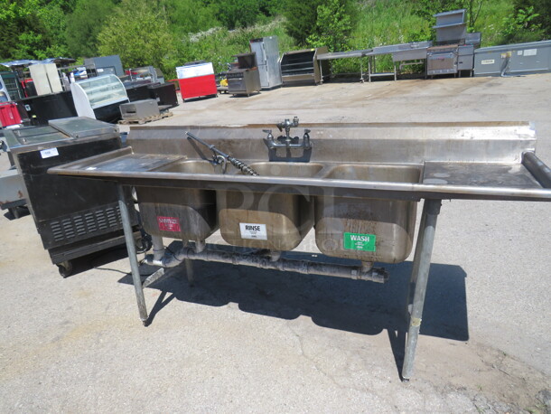 One 3 Compartment Sink With Faucet, Hose Sprayer, And R/L Drain Boards. 90X27X43 - Image 1 of 3