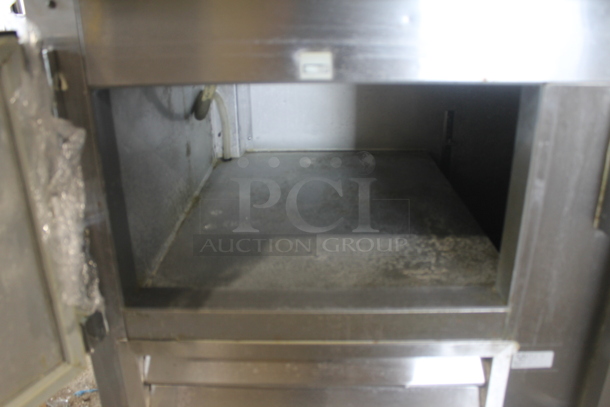 2014 Leader ESPT72SC Commercial Stainless Steel 3-Door Pizza Prep Table With Marble Style Countertop, Lift Up Lids, Plastic Drop-In Bins And Steel Racks On Commercial Casters. 115V. Tested and Powers On But Does Not Get Cold
 - Image 6 of 10