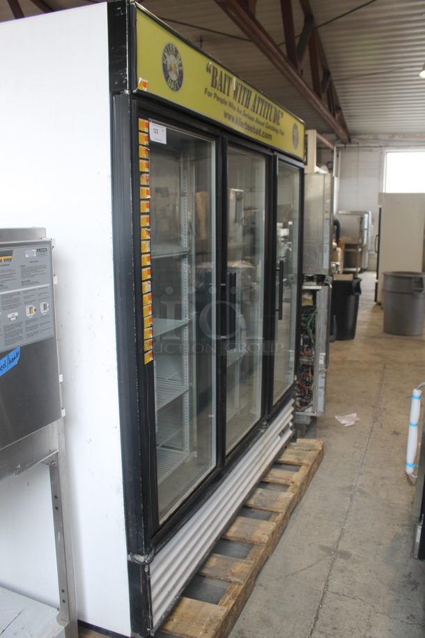 2012 True GDM-72F Commercial Three Swing Door Merchandiser Freezer With Polycoated Racks. 115/208-230V, 1 Phase.  - Image 2 of 7