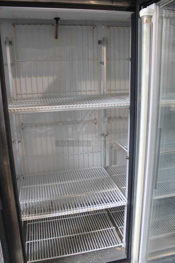 2012 True GDM-72F Commercial Three Swing Door Merchandiser Freezer With Polycoated Racks. 115/208-230V, 1 Phase.  - Image 5 of 7