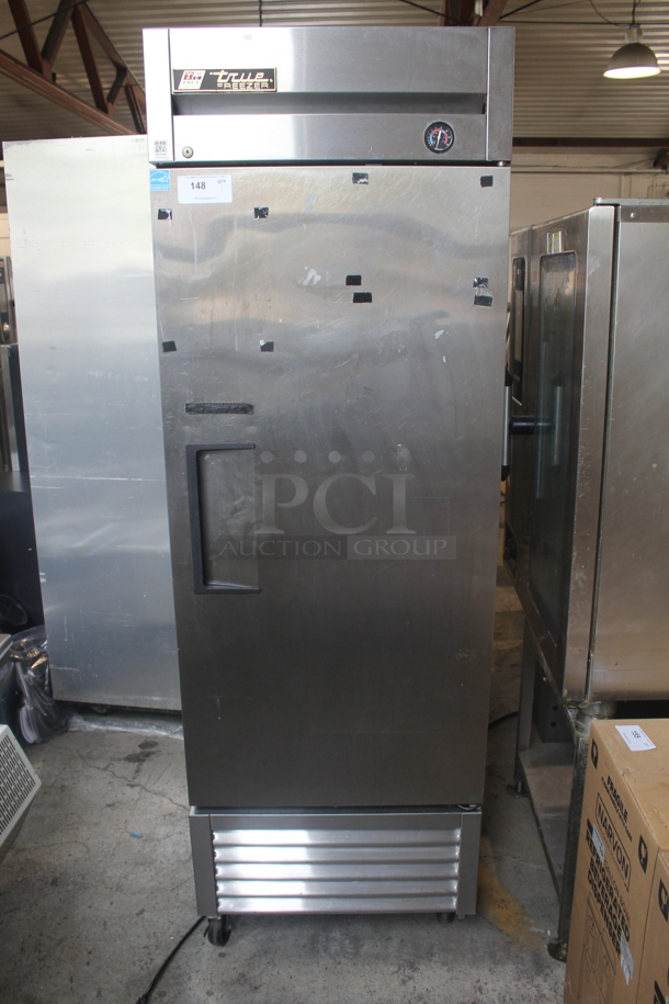 2013 True T-23F Commercial Stainless Steel Single Door Reach In Freezer With Polycoated Shelves On Commercial Casters. 115V, 1 Phase. Tested and Working!