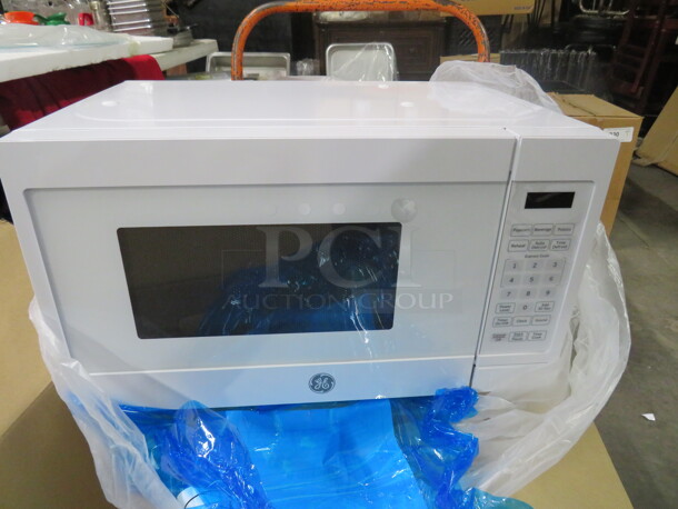 One NEW GE Microwave. Model# JEM3072. 10.5X17.5X13