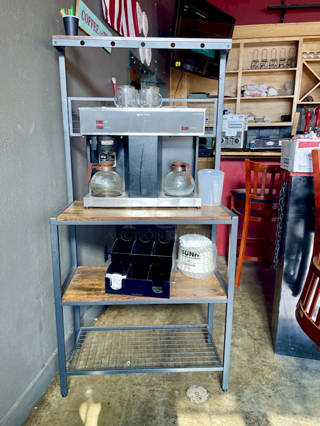 OUTSTANDING! Bunn Coffee Bar - Includes: Bunn 04275.0031 VPS 12 Cup Pourover Coffee Brewer with 3 Warmers - 120V (MODEL: VPS, BLK-LTD SW), 2 Coffee Decanters, 4 Glass Coffee Cups, Filters, Mind Reader Acrylic 9 Compartment Condiment Organizer, Black, FL310 Bakers Rack, Coffee Bar, Kitchen Storage Shelf Rack with Space For 10 Hooks, 3 Shelves, Adjustable Feet, for Microwave Oven. Combined Value of $850 
